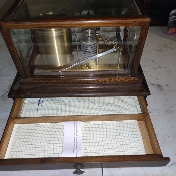 Beautiful Traditional barograph with draw for spare charts in a Rosewood case.