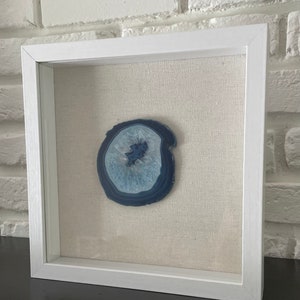 Elevate your space! Display a couple of these pieces together! One of a kind Blue Agate stone in White or Grey Shadowbox frame 10 x 10