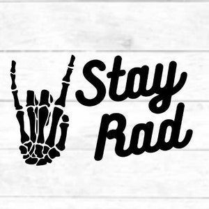 May include: Black and white graphic design with a skeleton hand making the rock and roll hand gesture. The text "Stay Rad" is written in a stylized font.