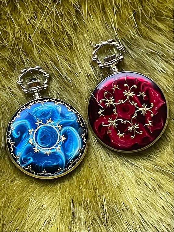 Blue enamel and gold pocket watch or Red enamel an