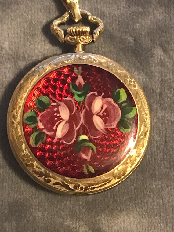 Red enamel guilloche floral pendant watches