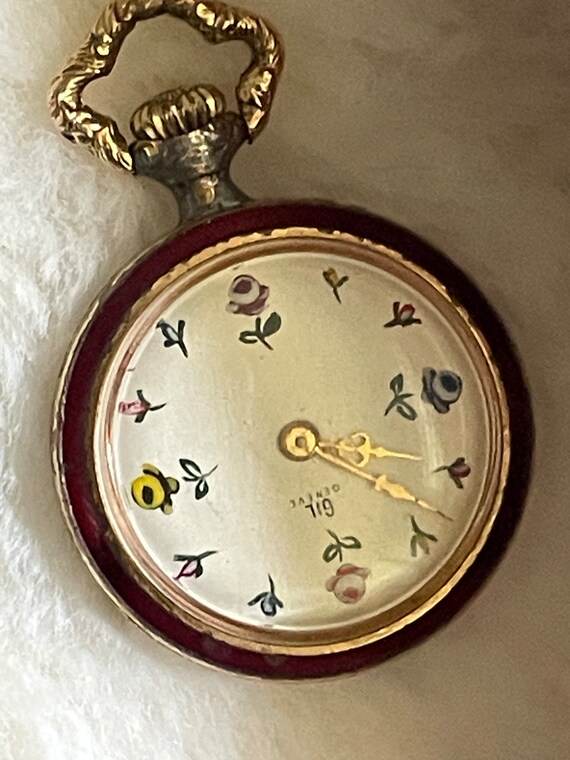 Vivid red enamel gold Gem