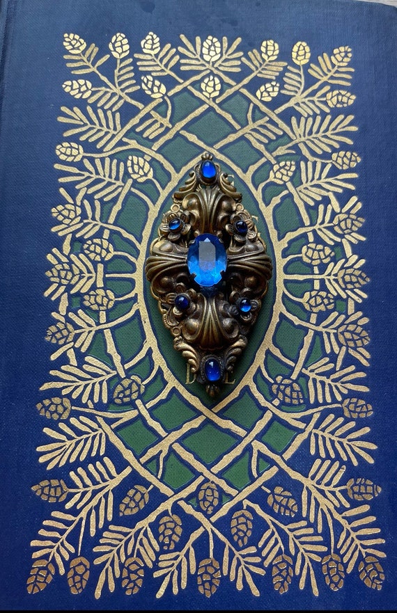 sapphire blue filigree brooch