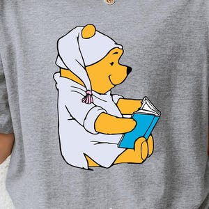 Winnie the Pooh Sleepy Bear Reading T-Shirt, Cute Cartoon Pajama Graphic Tee, Cozy Family Matching Outfit, Fun Disney Style Gift