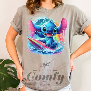 a woman wearing a gray shirt with a stitching stitch stitch stitch stitch stitch stitch