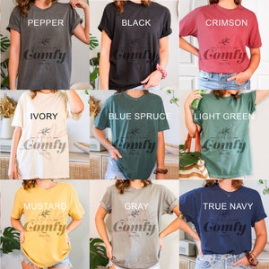 a group of people wearing different colored shirts