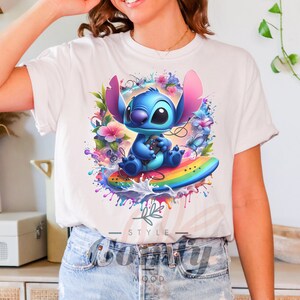 a woman wearing a t - shirt with a picture of stitching stitching on