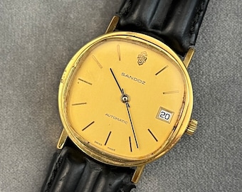 Vintage Sandoz unisex automatisch horloge, 34 mm goudkleurige kast, Zwitserse makelij, klassieke zwarte leren band