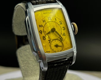 Reloj de pulsera Vintage Westclox Art Deco Ben - Hecho en EE.UU. - Alrededor de 1950 - Esfera negra - Caja Tonneau - Reloj estilo James Dean - Correr