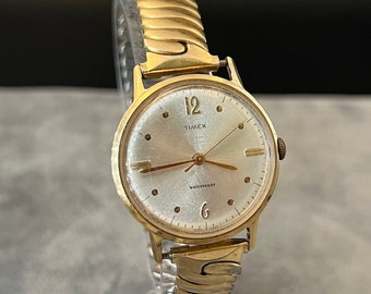 Montre à remontage mécanique pour homme Timex Mercury vintage des années 1960, boîtier de 34,7 mm, ton doré, bracelet extensible, style classique, cadeau pour homme