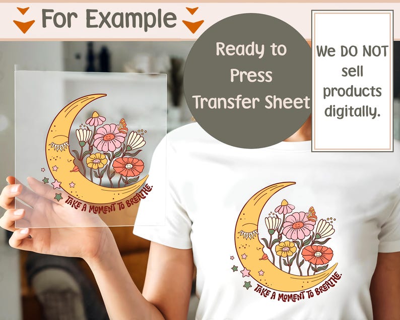 May include: A clear transfer sheet featuring a yellow crescent moon with a face, flowers, and the text "TAKE A MOMENT TO BREATHE." The design is also printed on a white t-shirt. The image also includes the text "Ready to Press Transfer Sheet."