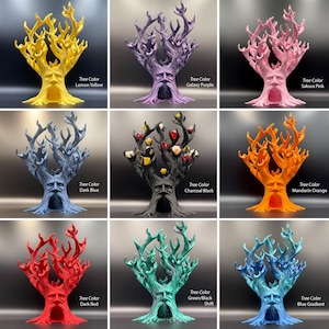 K&ouml;nnte beinhalten: Eine Sammlung von neun baumf&ouml;rmigen Skulpturen mit Gesichtern, die jeweils eine hohle Basis und verzweigte &Auml;ste aufweisen. Die Farben umfassen Zitronengelb, Galaxie-Lila, Sakura-Rosa, Dunkelblau, Anthrazit mit W&uuml;rfeln, Mandarinenorange, Dunkelrot, Gr&uuml;n/Schwarz-Shift und einen blauen Farbverlauf.