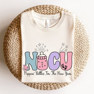 NICU Poppin' Bottles For The New Year Shirt • Neonatal ICU Nurse New Years Eve Tshirt • Neonatal Intensive Care Nursing Gift • Group Tees
