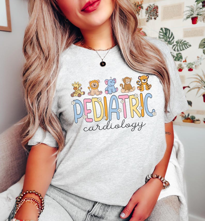 May include: A grey t-shirt with a colourful graphic of animals and the text "PEDIATRIC cardiology".