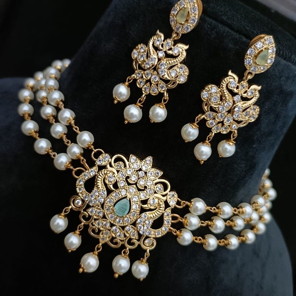 Sabyasachi Inspired Gold Finish Choker Set with Pearls and American Diamond Stones - Turquoise