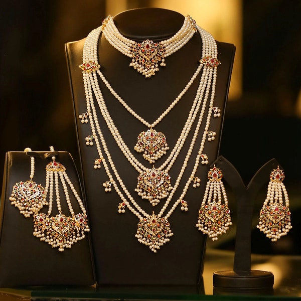 Gold Finish Navratan and Pearl Bridal Set with Necklaces, Earrings, Tika, and Jhoomar