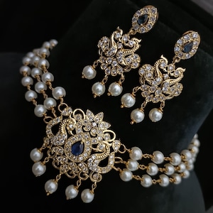Sabyasachi Inspired Gold Finish Choker Set with Pearls and American Diamond Stones - Blue
