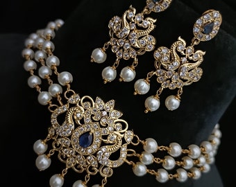 Sabyasachi Inspired Gold Finish Choker Set with Pearls and American Diamond Stones - Blue