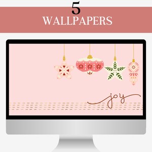 May include: A computer screen displaying a pink background with five hanging Christmas ornaments. The ornaments are a star, a round ornament, a star, and two teardrop ornaments. The text "joy" is written in cursive at the bottom of the screen.