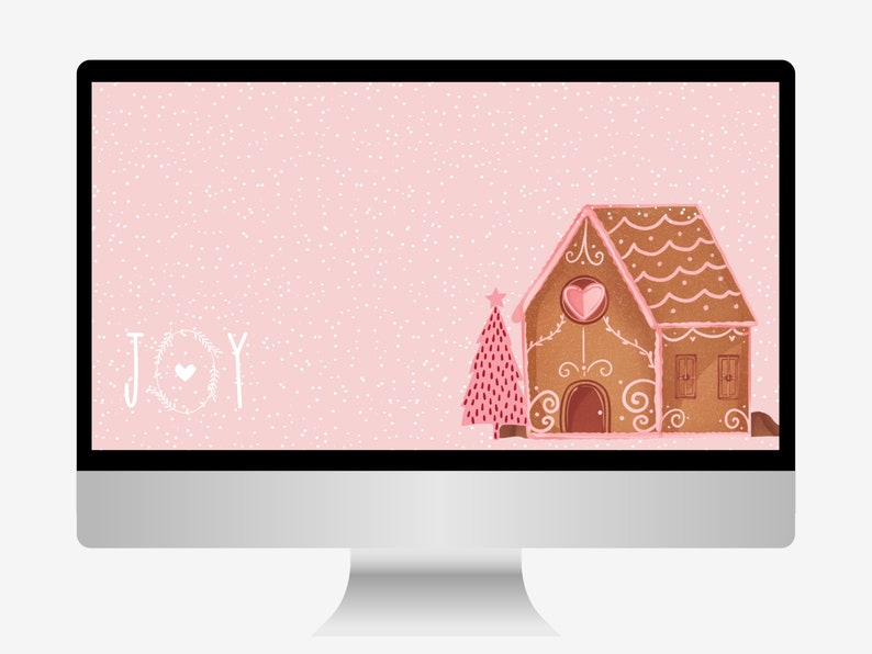 May include: A pink computer screen with a white gingerbread house and a pink Christmas tree. The background is a light pink with white dots. The text "JOY" is written in white with a heart in the middle of the "O".