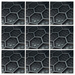 May include: A close-up of a black and gray honeycomb pattern. The pattern is made up of small hexagons that are arranged in a repeating pattern. The pattern is slightly raised, giving it a 3D effect.