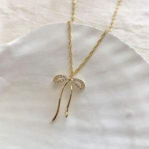 Gold and Silver Diamond Bow Necklace