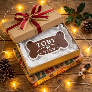 May include: A rustic wooden sign with the text "Welcome to our home" in white lettering. The sign features a distressed finish and a simple, inviting design, perfect for entryway decor.