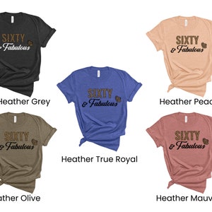 May include: Six different color t-shirts with the text "SIXTY & Fabulous" in a leopard print font. The colors are dark heather grey, heather peach, heather true royal, heather olive, and heather mauve.