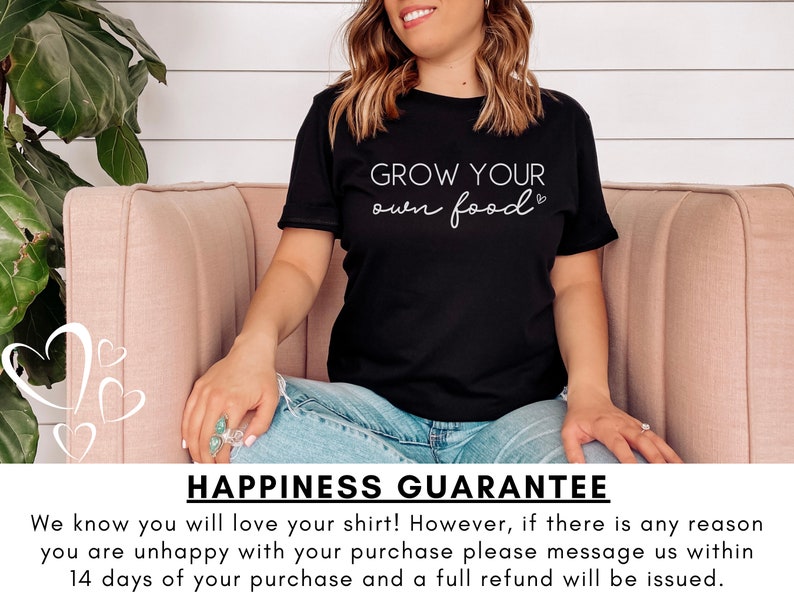 May include: A woman wearing a black t-shirt with the text "GROW YOUR own food" in white lettering. She is sitting on a pink couch. The text "HAPPINESS GUARANTEE" is at the bottom of the image.