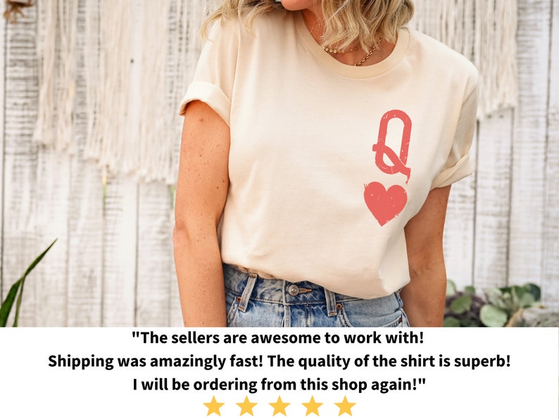 May include: A white t-shirt with a red queen of hearts graphic. The text "The sellers are awesome to work with! Shipping was amazingly fast! The quality of the shirt is superb! I will be ordering from this shop again!" is written below the image.