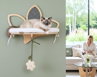 DAISY SOLO Modern wall-mounted cat furniture with beds,scratching felt and toys.Handmade shelves in natural plywood with milky-colored beds.