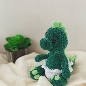 Crochet pattern dino, crochet christmas toy, amigurumi christmas pattern, crochet dino pattern,christmas crochet decor, plusie dinosaur image 6