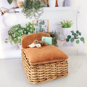 1:12 dollhouse miniature wicker armchair with cushions.