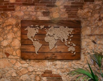 Rustic wooden world map string art style