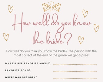May include: Bridal shower game card with the text "How well do you know the bride?" in pink script. The card has a beige background with gold hearts and diamond graphics. Includes fill-in-the-blank questions.