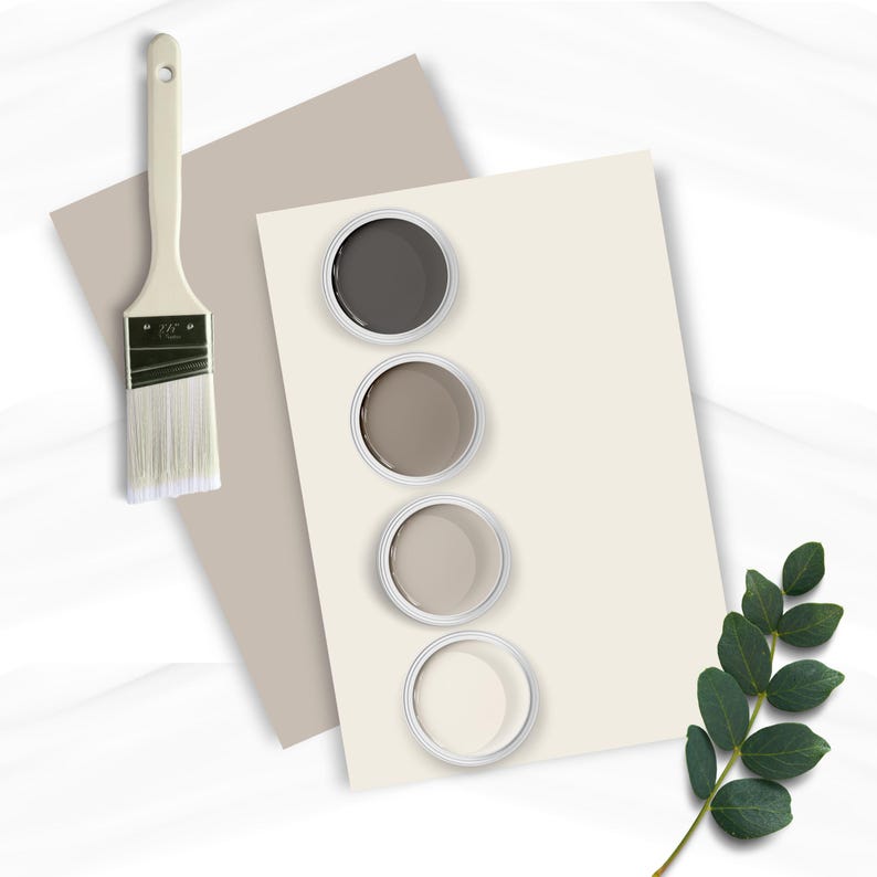 May include: Five paint samples in small round containers, arranged vertically on a beige surface. The samples range in colour from dark grey to light beige. A paintbrush is on a beige surface to the left of the paint samples.