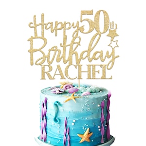 May include: Gold glitter cake topper with the text "Happy 50th Birthday Rachel".
