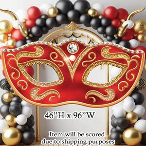 May include: A large red and gold masquerade mask with rhinestones around the edges. The mask is 46 inches high and 96 inches wide.