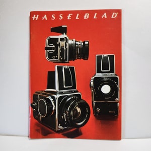 Catálogo Hasselblad 1974/1975 câmeras, lentes e acessórios. Inclui carta original do vice-presidente executivo da Hasselblad
