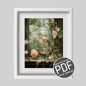 Peut inclure: Un modèle de point de croix représentant un oiseau dans un dôme en verre entouré de roses roses et de feuillage vert. Le modèle est disponible en téléchargement instantané au format PDF.