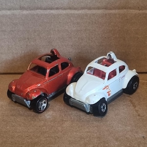 2 x Vintage 1980s Hotwheels die-cast cars, 1:64, Baja Bug, one with Blackwalls, both in good survivor condition, some wear