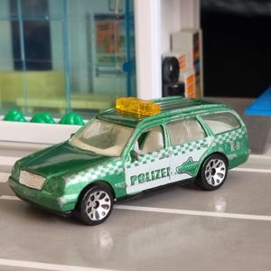 Vintage 1999 Matchbox  die-cast model car, no.56, Mercedes E-Class Estate police green good condition unrestored