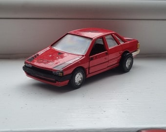 Vintage circa early 1980s unbranded die-cast car - Audi 80? Playworn, new front bumper made by hand, extremely rare and obscure