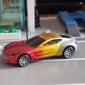 Unique one-off Hotwheels die-cast Aston Martin One-77, 1:64 scale, restored and customised, candy paint colour fade, one of a kind