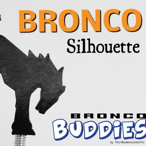 May include: Black silhouette of a rearing horse, a Bronco logo, with the text "Bronco Silhouette" and "Bronco Buddies by ThirdDimensionGifts" below.