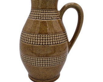 Vintage earthenware wine pitcher