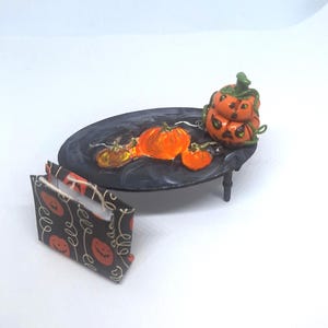Dollhouse miniature Halloween themed handmade coffee table with painted pumpkins - three-piece set ready for trick or treat!