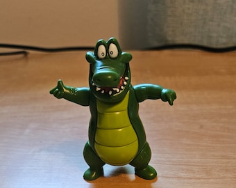 Figura de acción de cocodrilo vintage del Nilo, original del Rainforest Cafe, del año 2000. Mide aproximadamente 8,9 cm de alto. Se mantiene de pie, sus articulaciones se mueven y la cabeza gira.