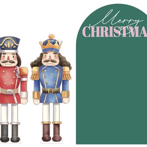 May include: Watercolor illustration of two toy nutcrackers, one in a red uniform and the other in blue. The red nutcracker has a black hat and the blue one has a gold crown. A green arch with the words "Merry Christmas" in white and pink is on the right.