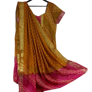 Classic Handcrafted Silk Bandhini Suit  with Brocade Lace. Comes With Pure Silk Full Bandhini Dupatta and Bandhini Pyjama